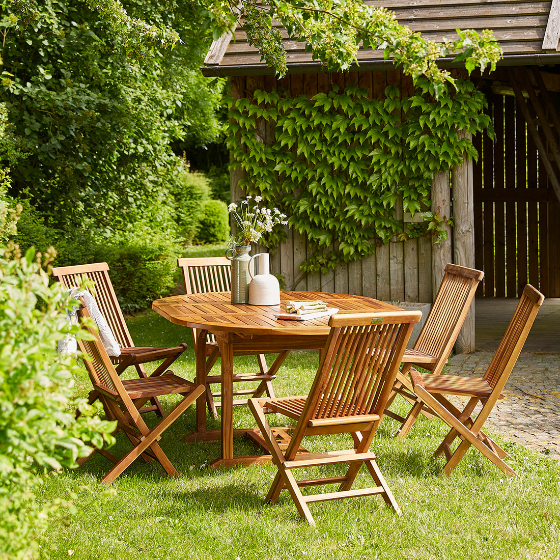 BALI - Set di mobili da giardino con tavolo allungabile in teak massello oliato 6/8 pers.