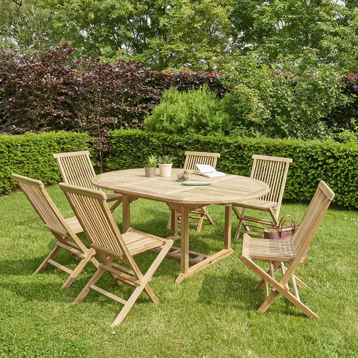 MIDLAND - Tavolo da giardino ovale allungabile in teak massello per 6/8 persone.