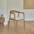 Sedia in teak massello con seduta bouclé