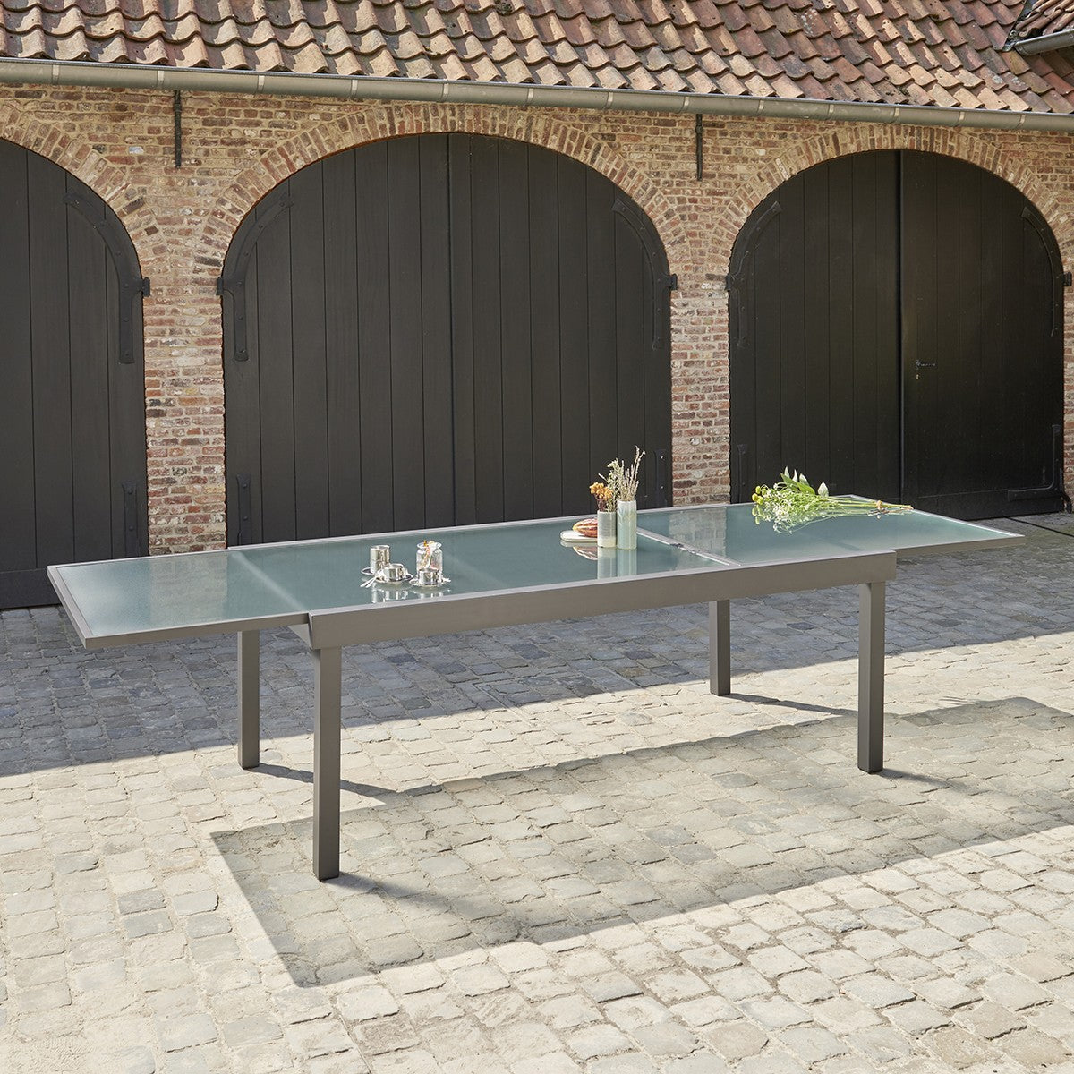 MODULO - Tavolo da giardino allungabile in alluminio grigio 8/12 pers.