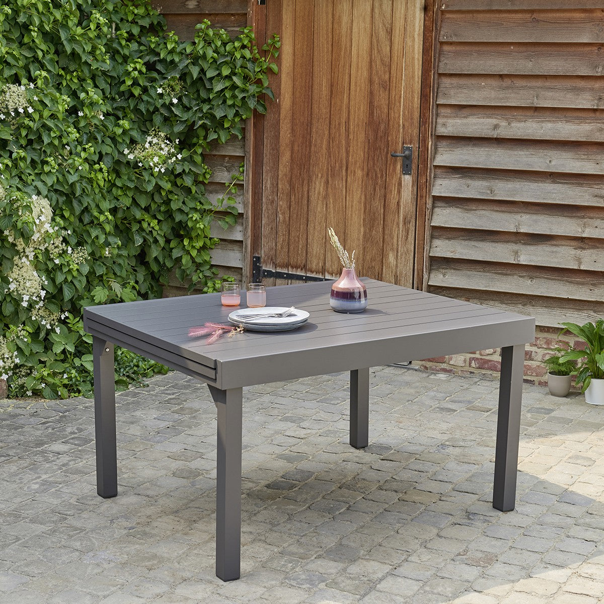 MODULO - Tavolo da giardino allungabile in alluminio grigio 6/10 pers.