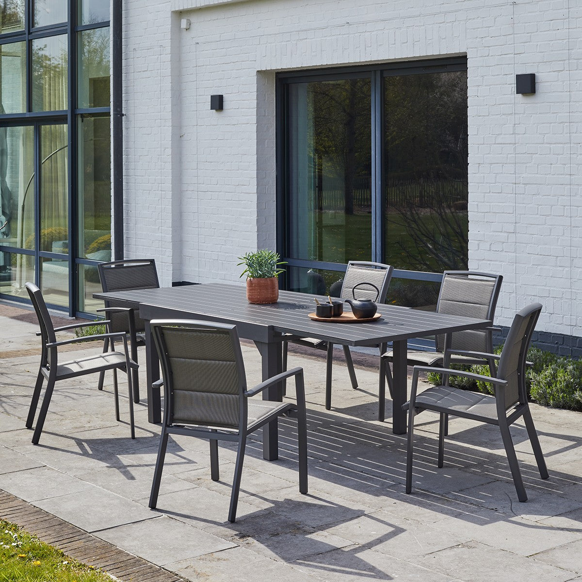 MODULO - Tavolo da giardino allungabile in alluminio grigio 6/10 pers.