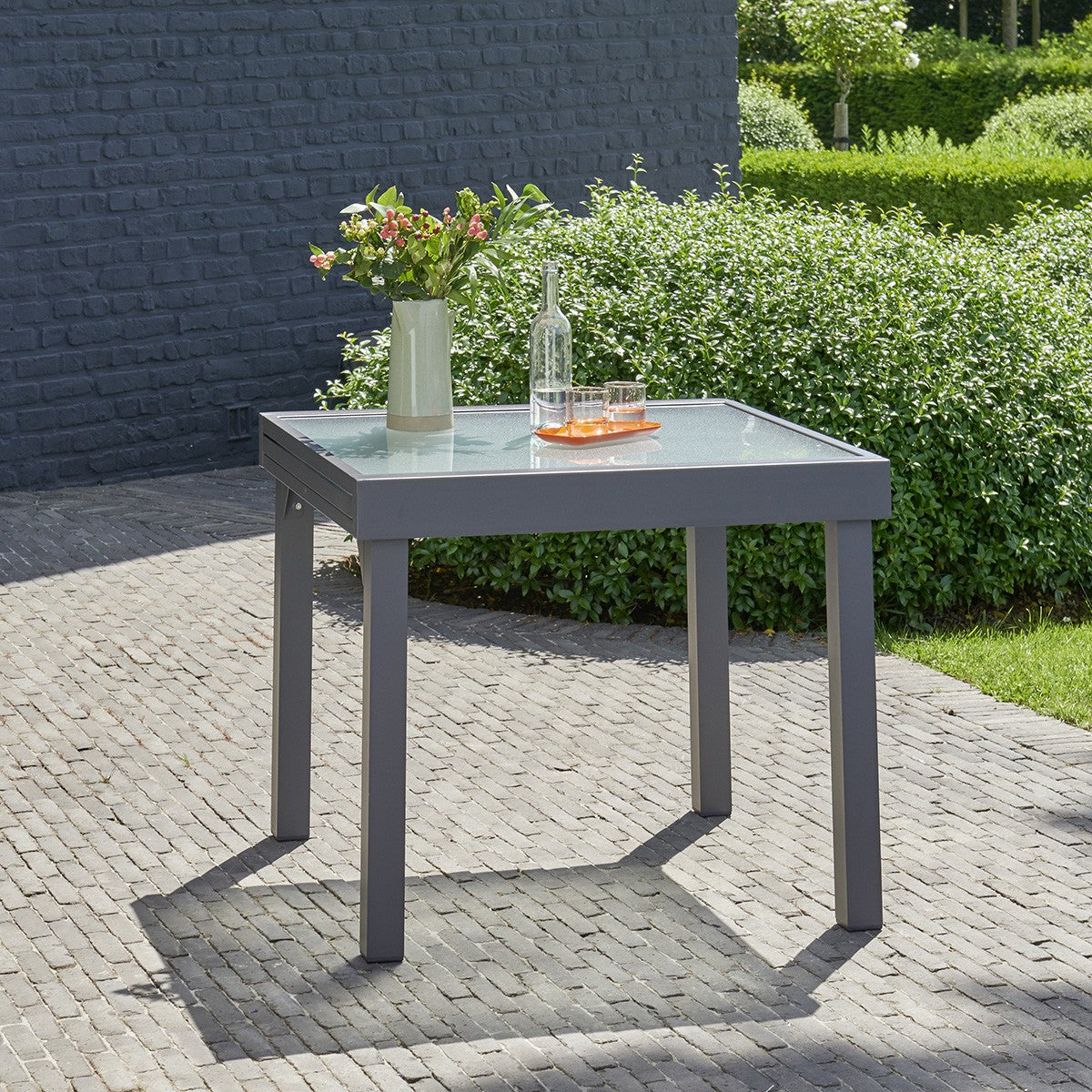 MODULO - Tavolo da giardino allungabile in alluminio grigio 4/8 pers.
