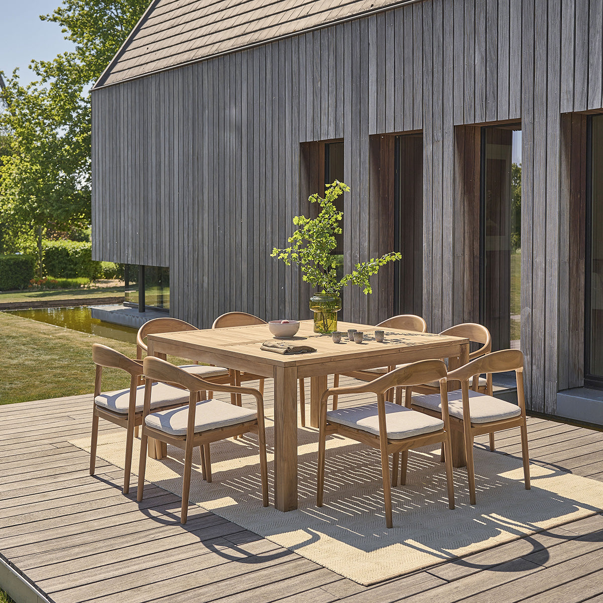 AMBRE - Poltrona da giardino in teak massello con cuscino grigio-beige