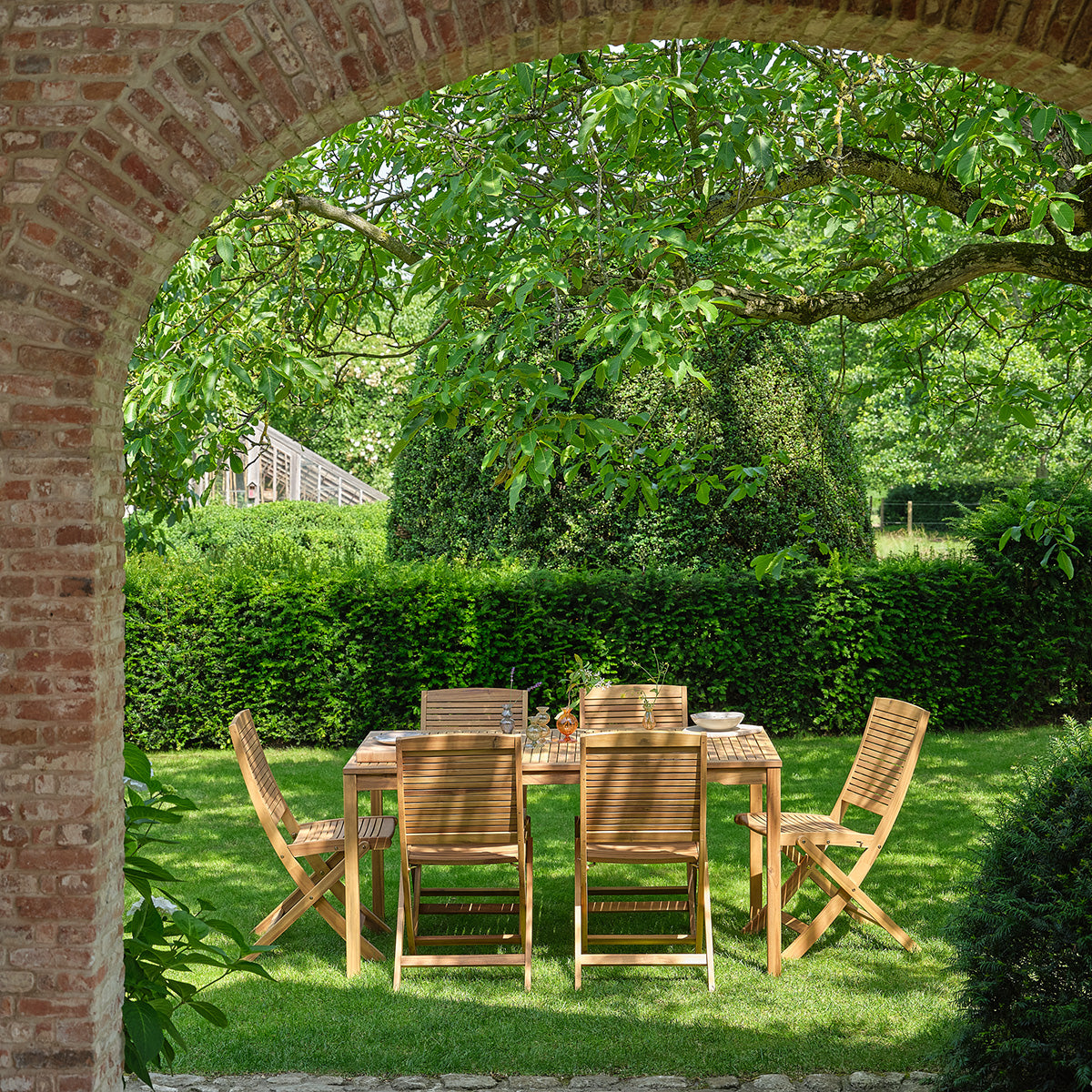 MILOS - Set da giardino in legno massello di acacia oliato, 6 posti.