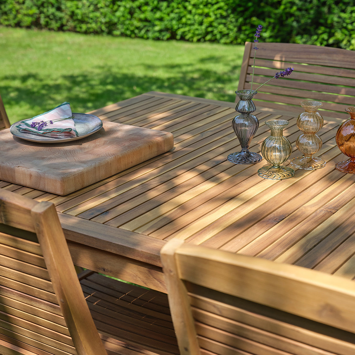 MILOS - Set da giardino in legno massello di acacia oliato, 6 posti.