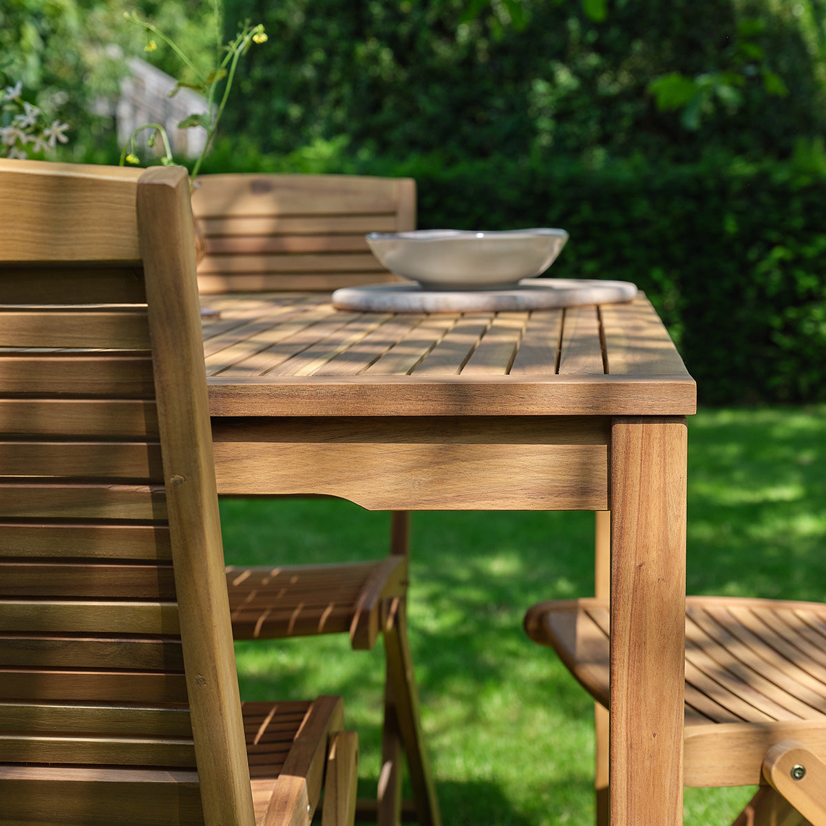 MILOS - Set da giardino in legno massello di acacia oliato, 6 posti.