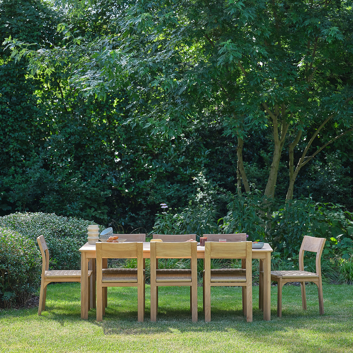 PIANA - Set da giardino in teak massiccio e rattan per 8 persone.