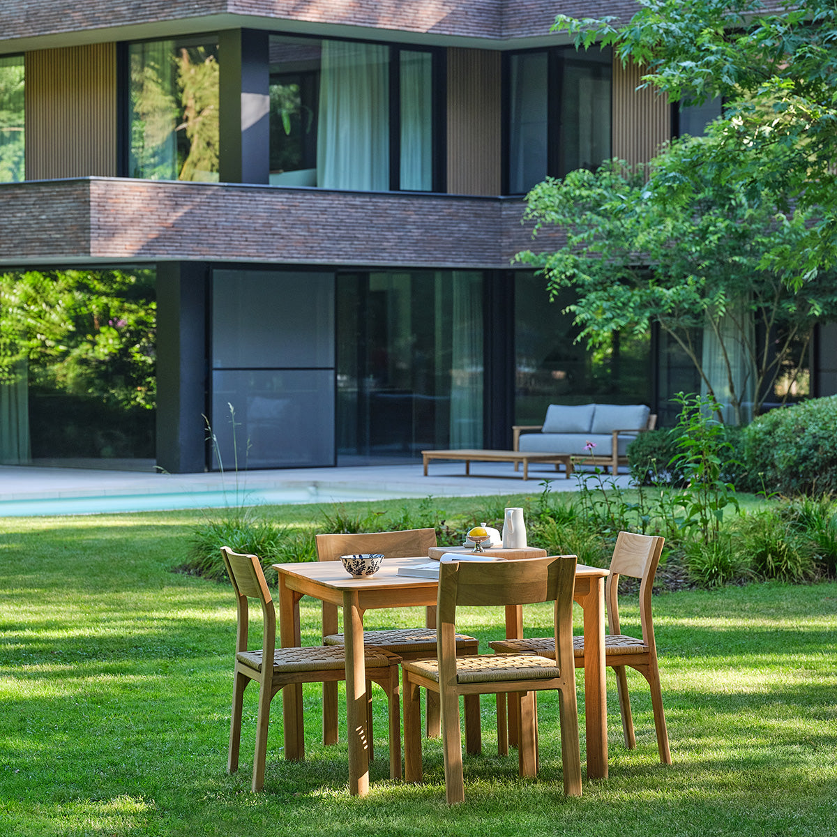 PIANA - Set da giardino in teak massiccio e rattan per 4 persone.